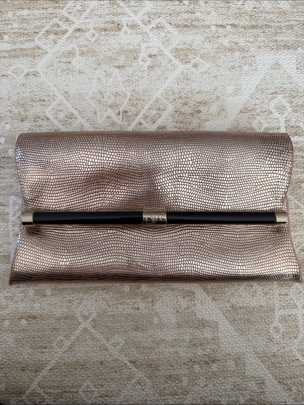Metallic Rose Gold Textured Clutch with Bar Accent